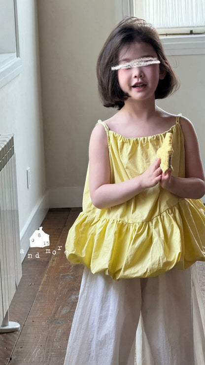 黃色吊帶花苞上衣