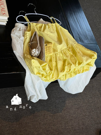 黃色吊帶花苞上衣