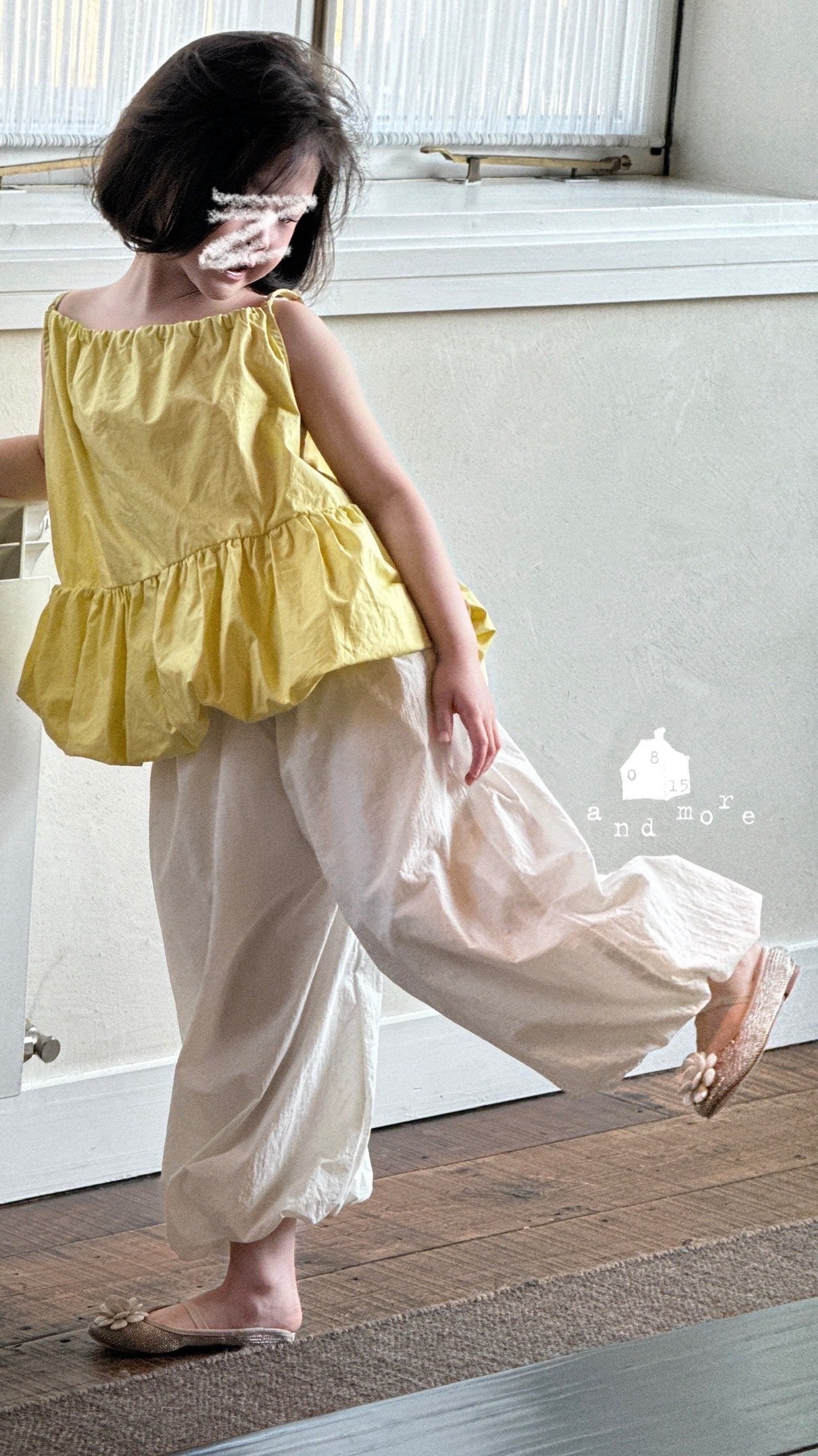 黃色吊帶花苞上衣